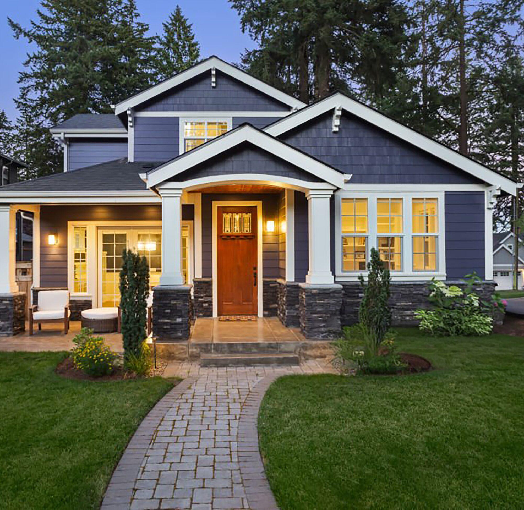 Craftsman-style home exterior at dusk