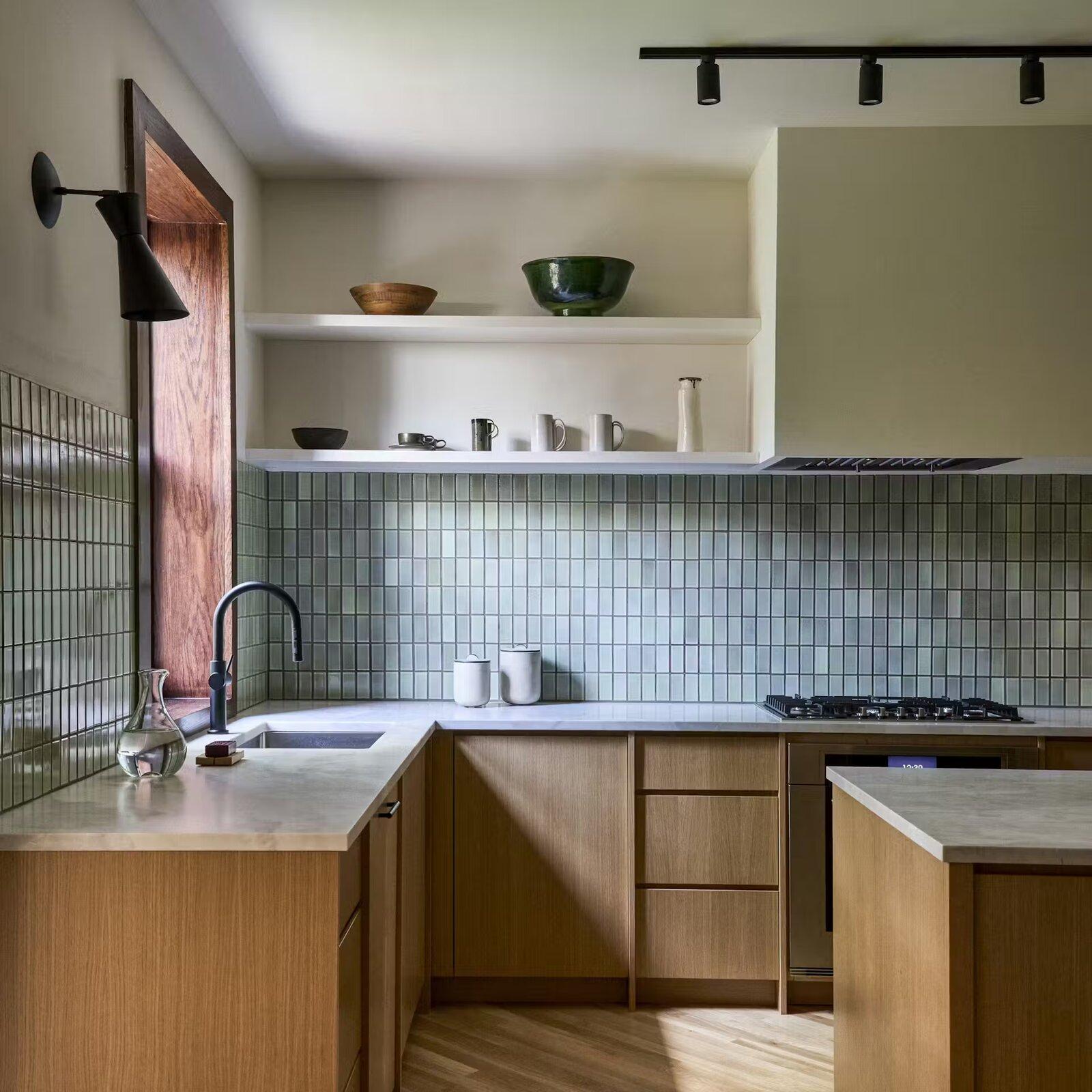Open kitchen after a wall removal and structural beam installation